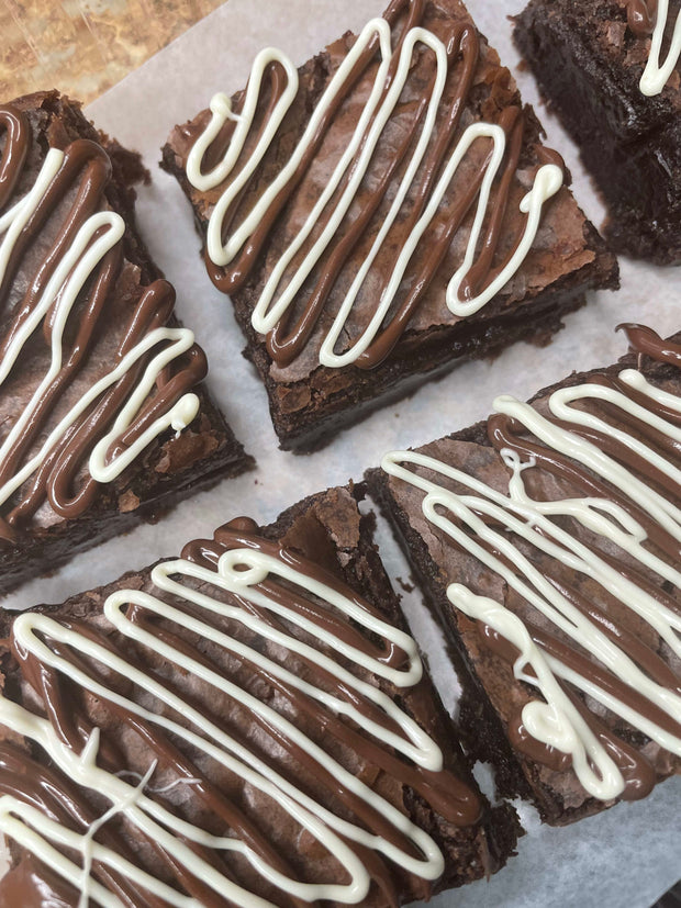 Chocolate Drizzle Brownies are deluxe brownies with white chocolate or chocolate drizzle topping